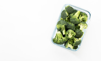 Washed And Sliced Broccoli Crown In Glass Container.V