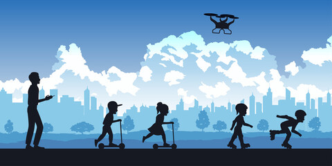 Silhouette of activities of people in park man playing drone,chlidren play scooter and roller skate