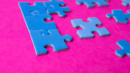 unassembled blue puzzles. general background