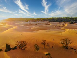 Aerial view of Red Sand Dunes (local name is Doi Cat Do), also known as Golden Sand Dunes, is located near Hon Rom beach, Mui Ne, Phan Thiet city
