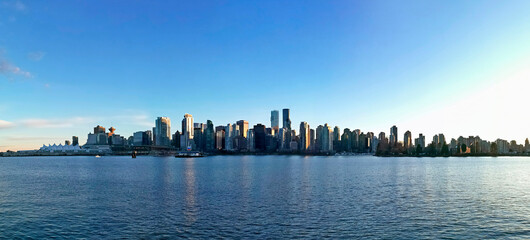 Wide panorama of Vancouver skyline. A view from Stanley Park.