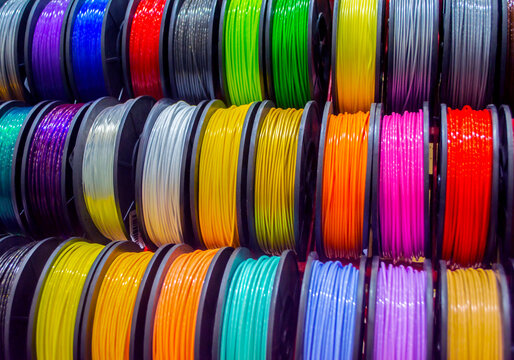 Multicolored filaments of plastic for printing on 3D printer close-up
