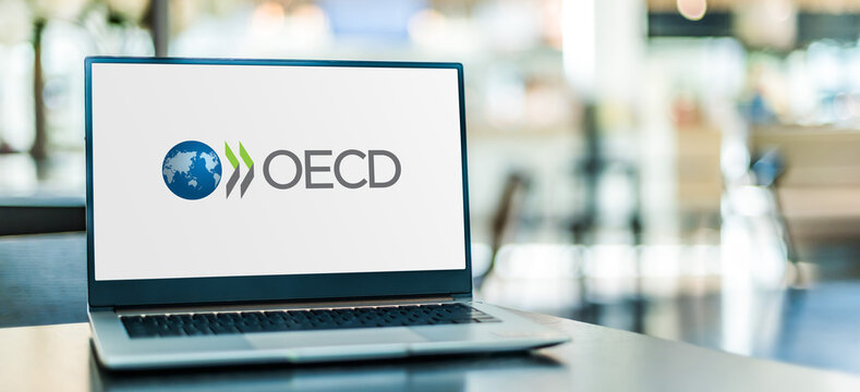 Laptop computer displaying logo of OECD