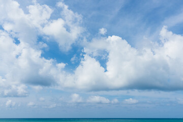Naklejka na ściany i meble Beautiful blue sky with white cloud and sea
