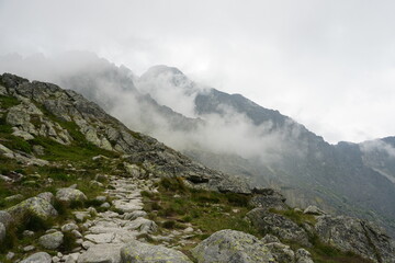 Fototapeta na wymiar Beautiful High Tatras mountains landscape in Slovakia. Mountains with clouds
