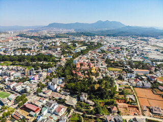 Aerial view of The Golden Buddha statue or Thien vien Van Hanh in Dalat city in Vietnam.