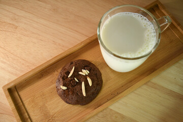 brownie double chocolate soft bake cookie with glass of white milk