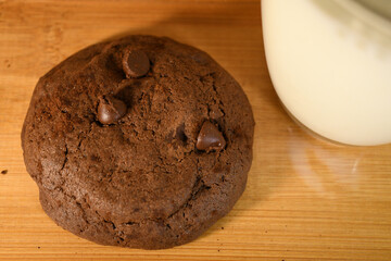 brownie double chocolate soft bake cookie with glass of white milk
