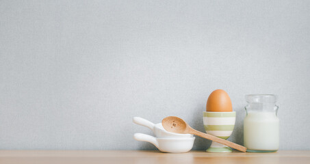 kitchenware decoration on wooden shelf with copy space