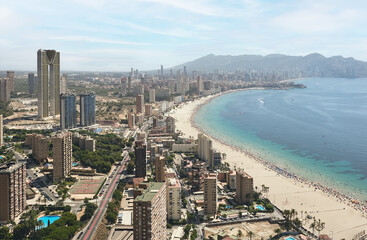 Obraz premium Aerial view of the city of Benidorm, Alicante on the Costa Blanca of Spain. Poniente beach and skyline in summer