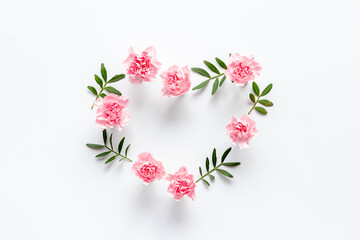 Heart of flowers - Valentines Day background, top view