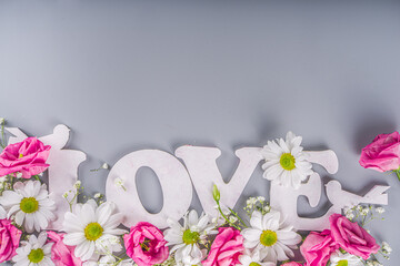 Valentine day, Mothers day background, Inscription I Love You with flowers 