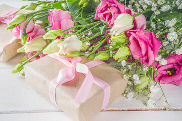 Beautiful spring flowers with gifts