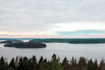 Fototapeta na wymiar Beautiful winter landscape view of water, islands, sky and horizon in the Stockholm archipelago.
