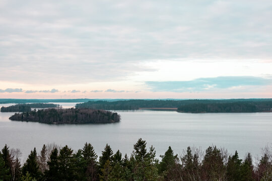 Beautiful winter landscape view of water, islands, sky and horizon in the Stockholm archipelago.