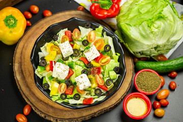 Greek salad top view dark theme