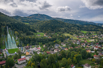 Fototapeta premium Szczyrk ski jumping hill in beskid,silesia, Poland aerial drone photo