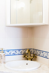 Ceramic Water tap sink with faucet with decorative flower in expensive loft bathroom or kitchen