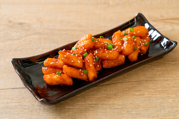 deep fried Korean rice cake (Tteokbokki) skewered with spicy sauce