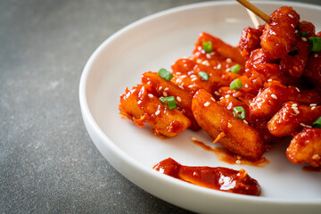 deep fried Korean rice cake (Tteokbokki) skewered with spicy sauce