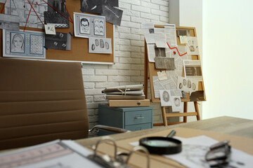 Modern detective office with workplace and board