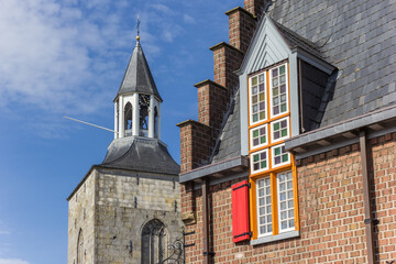 Colorful window and church tower in the center of Tubbergen, Netherlands
