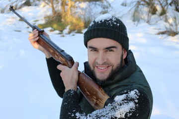 Hunter in the winter with snow