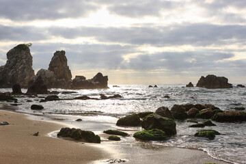 Fototapeta na wymiar sea and rocks at sunset