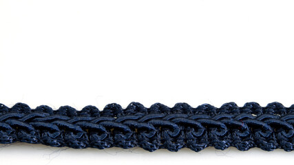 Machine-made colorful lace samples on a white background