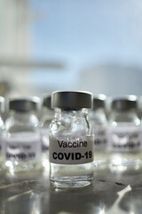canisters with covid-19 vaccines