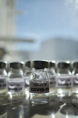 canisters with covid-19 vaccines