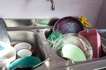 Crockery in the sink in the kitchen.