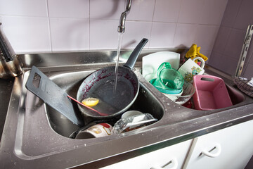 Crockery in the sink in the kitchen.