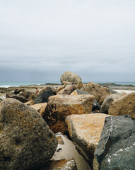 Portrait of the Currumbin rock with the sea wall