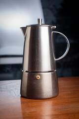 A steel coffee maker ready to work