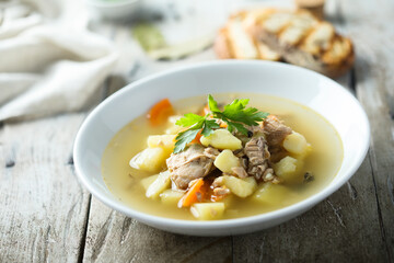 Traditional homemade fish soup with vegetables