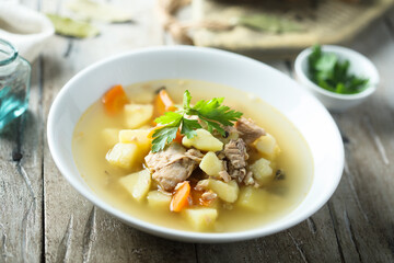 Traditional homemade fish soup with vegetables