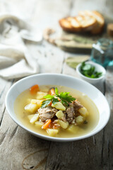 Traditional homemade fish soup with vegetables