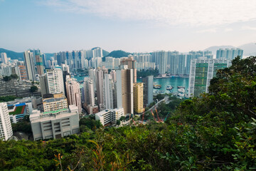 Obraz premium Panoramic Aerial view over Tin wan, Aberdeen and Ap Lei Chau district seen from Hong Kong Trail sec. 2, This is a popular hiking route for People living healthy active lifestyle outdoors.