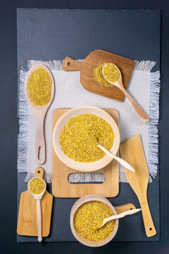 Raw grain Bulgur porridge. Healthy, dietary, vegan gluten free product. vertical photo