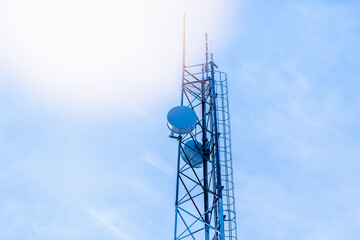 Network telecommunication equipment mounted on a metal tower