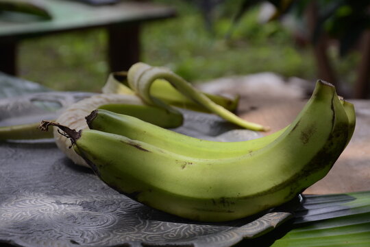 green banana fruit on the table