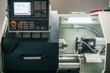 Cnc machine. The CNC lathe machine or Turning machine. Turning numerical control machine with tools and chuck fot automotive.