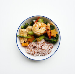 Thai style stir-fry vegetables with rice isolated, Top down view of Thai food