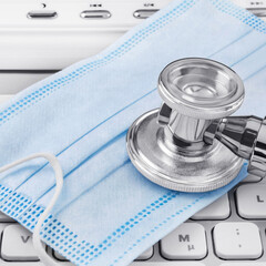 Face mask and stethoscope with PC keyboard