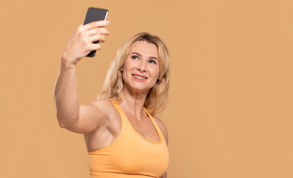 Workout streaming video or selfie from trainer blogger shot, free space