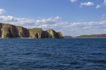 Fototapeta na wymiar Popovs islands coastal line on sunny day