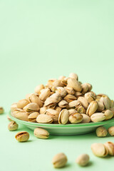 toasted pistachios in a plate. Nuts vegan protein