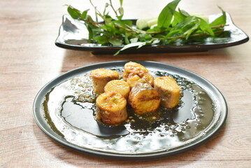 grilled hen egg cutting dressing spicy and sour sauce with fresh vegetable