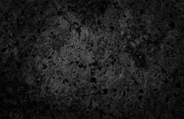 Dark tone granite surface. Intrusive igneous rock.
